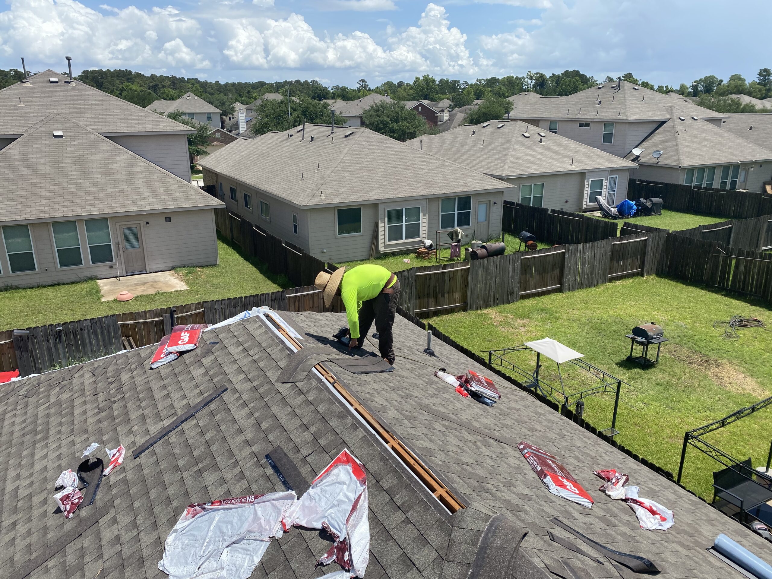 Roofing crew at work on a Houston job site