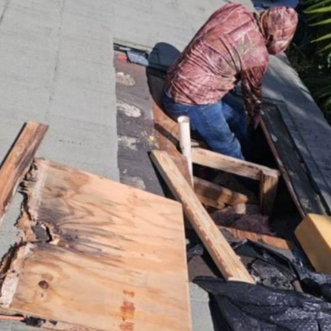 R-panel roof showing damage signs on a Richmond, Houston-area property