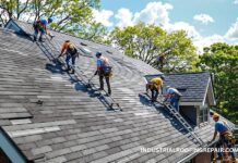 When’s the Best Time for Roof Replacement in Houston? Seasonal Pros & Cons Roofing crew replacing shingles on a Houston home during mild spring weather with clear skies and trees in bloom.